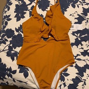 Large burnt orange one piece swim suit